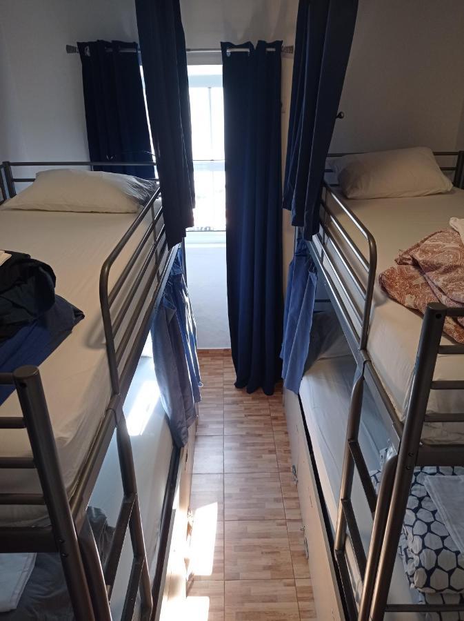 Cama em Dormitório Misto com 4 Camas