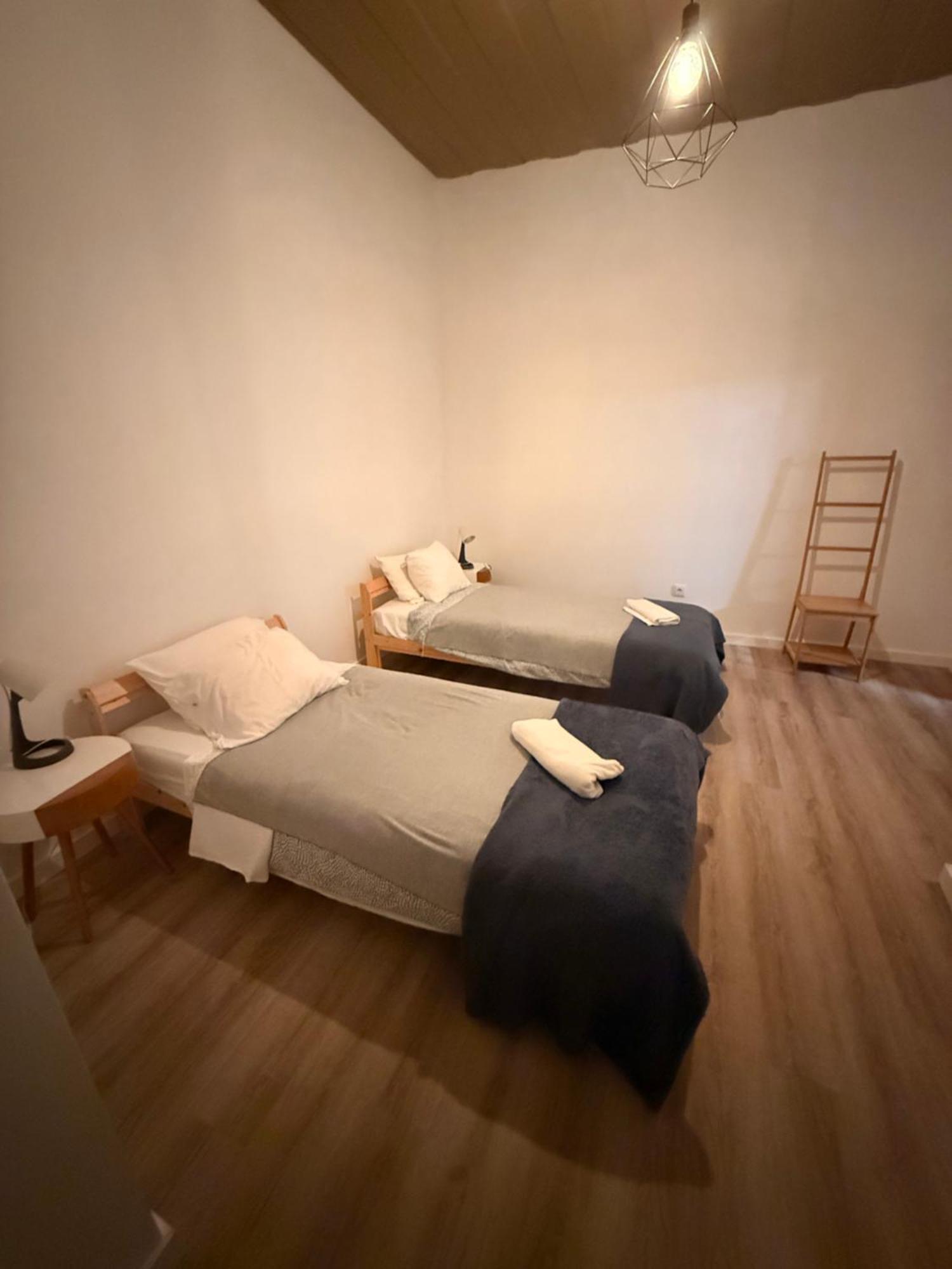 Camera Quadrupla con Bagno in Comune